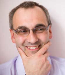 man pondering happily
